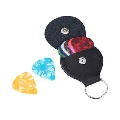 GUITAR PICKS AND HOLDER CASE INCLUDED